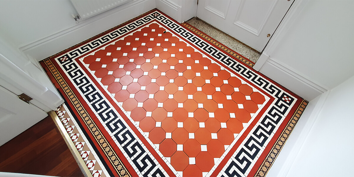 beautifully restored Victorian tiles, emphasising vibrant colours and patterns