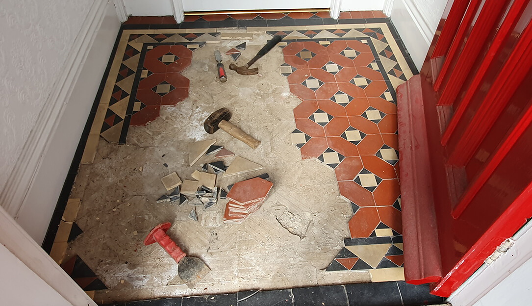 damaged victorian floor tiles